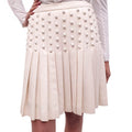CHANEL CREAM PLEATED STUDDED SKIRT WITH LOGO DETAIL - SIZE 42