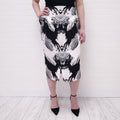 BURBERRY BLACK AND WHITE DEER PRINT PLEATED SKIRT - SIZE 4