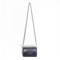 CHANEL BLACK AGED LEATHER WALLET ON MIXED METAL CHAIN