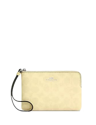 Coach Corner Zip Wristlet In Signature Canvas