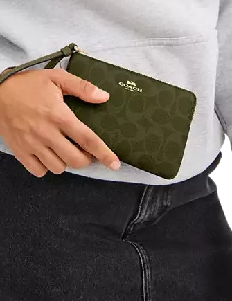 Coach Corner Zip Wristlet In Signature Canvas
