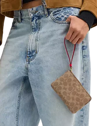 Coach Corner Zip Wristlet In Signature Canvas