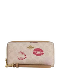 Coach Long Zip Around Wallet In Signature Canvas With Lips Print