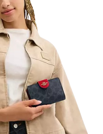 Coach Phone Wallet In Signature Canvas