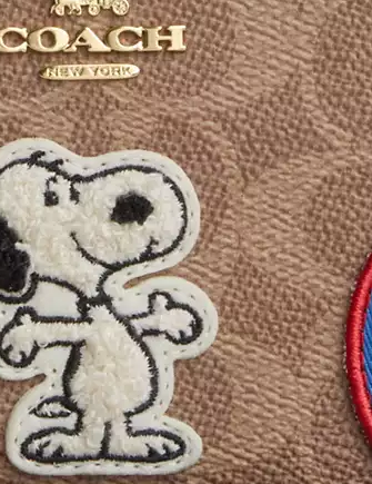Coach X Peanuts Long Zip Around Wallet In Signature Canvas With Patches