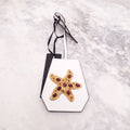 VERSACE WHITE STARFISH BAG CHARM