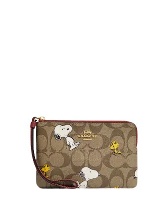 Coach X Peanuts Corner Zip Wristlet In Signature Canvas With Snoopy Woodstock Print